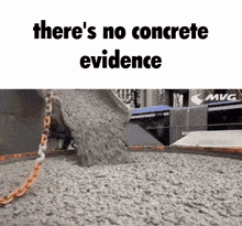 a bucket of concrete is being poured into a pile .