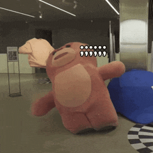 a pink teddy bear with the number 9999 on it