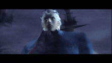 a video game character is standing on a ladder with a dragon in the background