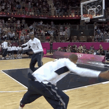 Low Five United States Mens Olympic Basketball Team GIF - Low Five United States Mens Olympic Basketball Team Olympics GIFs