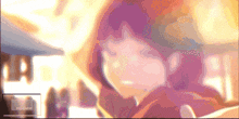a close up of a girl 's face in a blurry photo
