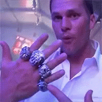 tom brady with rings on
