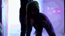 a pixelated image of a person with a smiley face on the bottom right