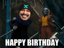 a man with a green x on his hat is standing next to a clown and the words happy birthday are below him