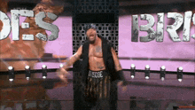 a wrestler with the word boscoe on his pants