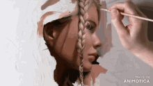 a person is painting a woman 's face with a braid and the words made in animotica on the bottom