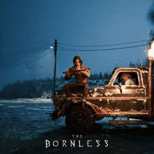 a man sits on the back of a truck with the words the bornless on the bottom