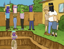 a group of people are standing around a hole in the ground