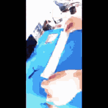 a person holding a piece of paper in their hand