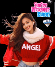 a woman wearing a red sweater with angel on it