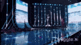 a woman stands on a stage in front of a large screen that says ' giggle.ai '