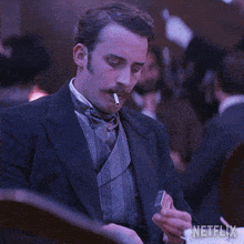 Ligthing Up A Cigarette Lucien GIF - Ligthing Up A Cigarette Lucien 1899 GIFs