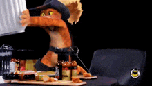 a cat in a cowboy hat is standing in front of a table with bottles of hot sauce on it