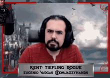 a man with a beard and headphones has kent tiefling rogue written on a sign