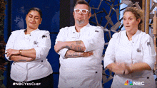 three chefs are standing next to each other with their arms crossed and the nbc logo in the corner