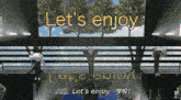 a sign that says let 's enjoy in yellow