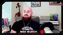 a man with a beard is wearing a black shirt that says space golf