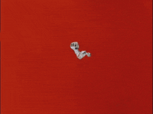 a close up of a person 's torso with red and white stripes on it