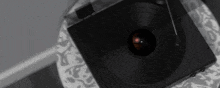 a record player with a record on it is on a table