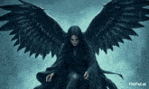 a woman with black wings is sitting in the rain with vidful.ai in the corner