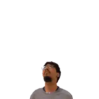 a man with glasses and a beard is looking up at the number 14