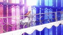 a woman in a white dress is standing on a balcony with a purple background