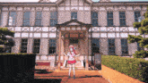 a girl stands in front of a building with a sign that says ' xixi ' on it
