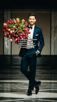 a man in a tuxedo holding a bouquet of flowers
