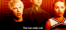a man and a woman are standing next to each other and the man is saying `` that was really rude . ''