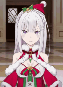 a girl with white hair and a santa hat on