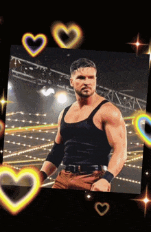 a man in a black tank top is surrounded by hearts and lights