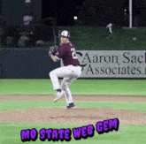 a baseball player with the number 23 on his jersey is about to throw the ball