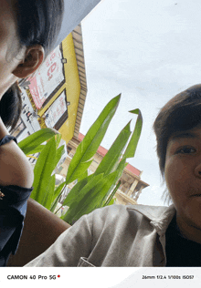 a photo of two people taken with a canon 40 pro sg