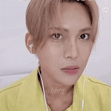a close up of a person wearing headphones