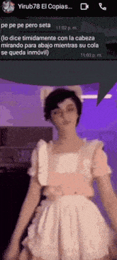 a woman in a maid costume is talking on a cell phone