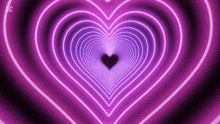a purple heart shaped tunnel with a black heart in the center .