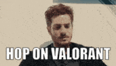 a man in a suit says hop on valorant
