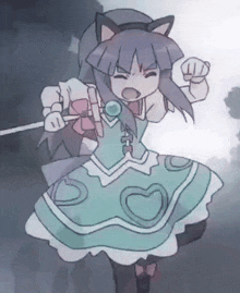 a cartoon of a girl in a green dress with a cat ear on her head .
