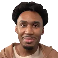 a man with a beard wearing a brown jacket