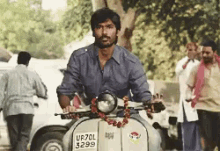 Eco Driving GIF - Driving Scooter Dhanush GIFs