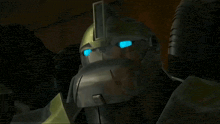 a close up of a robot 's head with blue eyes