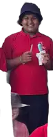 a boy in a red shirt is holding an ice cream cone and a toothbrush .