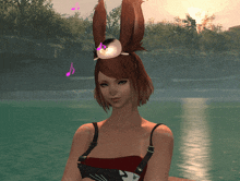 a woman wearing a squirrel ear headband with a cat in it
