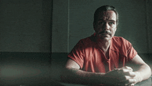 a man sitting at a table with the words " you wanna be a friend of the cartel " on the bottom