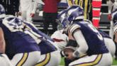 a football player wearing a helmet that says nfl on it