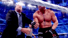 Brock Lesnar Paul Heyman GIF - Brock Lesnar Paul Heyman Wwe GIFs