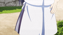 a close up of a person 's skirt with a purple stripe