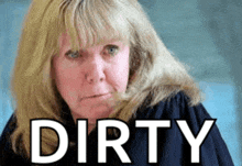 a woman with blonde hair and the word dirty in white letters