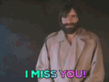 a man with glasses says i miss you