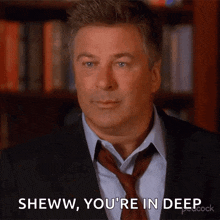 a man in a suit and tie is saying swww you 're in deep